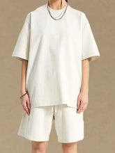 Cream half sleeve round neck t-shirt and shorts set, slightly stretchy