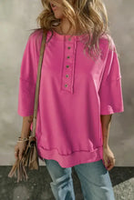 Hot pink half snap dropped shoulder sweatshirt with exposed seams