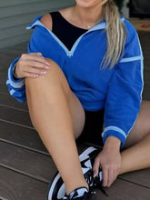Blue velour half zip dropped shoulder sweatshirt with light blue contrast stitching and off-the-shoulder design machine wash