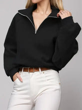 Black half zip long sleeve sweatshirt with wide collar