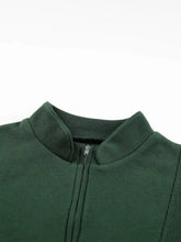 Dark green half zip stand collar sweatshirt with exposed seams and ribbed collar, slightly stretchy and machine wash safe