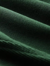 Dark green half zip stand collar casual sweatshirt with soft textured slightly stretchy fabric machine wash safe