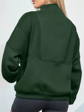 Dark green oversized half zip stand collar sweatshirt with ribbed cuffs hem slightly stretchy machine wash safe