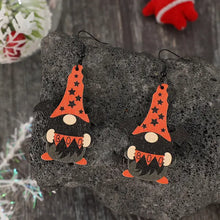 Halloween-nisseformade örhängen med träspetsmössa, texten "boo", stjärnor, fladdermusvingar