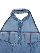 Blue denim halter neck button-front dress with stitched pocket details in a casual sleeveless design