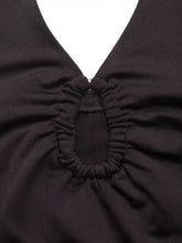 Black halter neck bodysuit with ruched gathered neckline detail in soft fabric for elegant wear