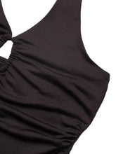 Black ruched halter neck bodysuit featuring a fitted silhouette and stylish halter neckline design