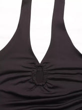 Black satin halter neck bodysuit featuring a ruched oval-shaped center detail for elegant styling