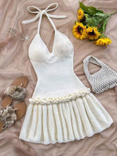 Creamy white ribbed halter neck ruffle hem knit sweater dress