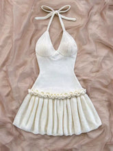Creamy white ribbed halter neck ruffle hem knit sweater dress