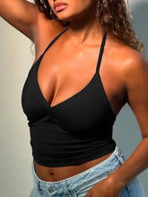 Black halter neck slim fit cami with deep v-cut neckline and fitted silhouette for stylish layering and comfort