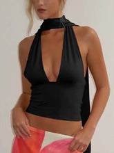 Black halter neck tie cami crop top with deep v-cut and draped fabric at neckline for stylish summer wear