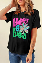 Black Happy Go Lucky letter graphic round neck short sleeve T-shirt with shamrock