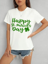 White short sleeve t-shirt with Happy St. Patrick’s Day text and shamrock