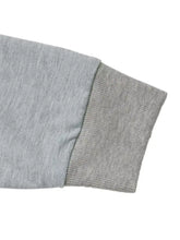 Gray heathered heart embroidered round neck sweatshirt with ribbed cuffs made of slightly stretchy material