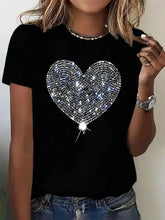 Black short-sleeve t-shirt with glittering silver heart graphic round neck
