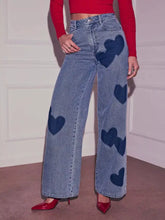 Blue denim heart high waist wide leg jeans featuring dark blue heart patches on wide leg pants