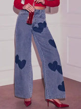Light-wash denim heart high waist wide leg jeans with dark blue heart patches for fashionable casual wear