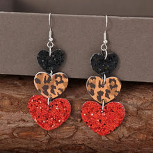 Heart leather drop earrings with black, leopard, and red glitter hearts