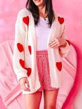 Cream dropped shoulder cardigan with red heart print appliques