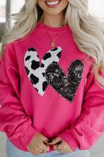Heart patch long sleeve sweatshirt in hot pink with cow print and distressed patches