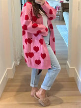 Pink heart pattern open front cardigan, knitted with red hearts