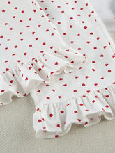 Heart Print Long Sleeve Top and Pants Lounge Set in white fabric with red hearts and ruffles