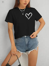 Black short-sleeve t-shirt with white heart graphic, round neck design