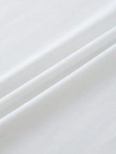 Smooth white fabric with diagonal folds on heart round neck short sleeve T-shirt