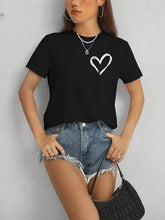 Womens black short sleeve t-shirt with white heart graphic