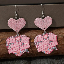 Pink glitter heart shape wooden earrings with You Make My Heart Sing design