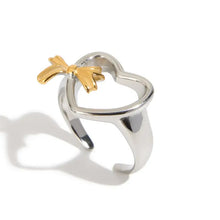 Silver heart-shaped open ring with gold-plated stainless steel bow accent