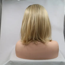 Heat safe synthetic blonde bob wig with dark roots on mannequin torso