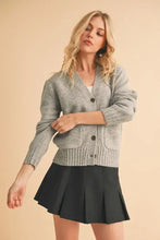 Heather Gray Cardigan with Ribbed Hem Button and Black Pleated Skirt