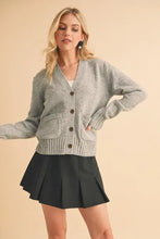 Heather gray cardigan with striped sleeves, ribbed hem button