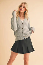 Heather gray cardigan with wooden buttons, ribbed cuffs and hem button