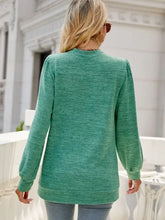Heathered green long sleeve V-neck sweater for women with puffed shoulders