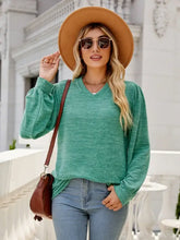 Heathered green long sleeve V-neck sweater for women