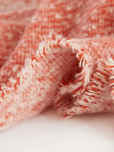 Heathered polyester scarf with raw hem in coral white textured design