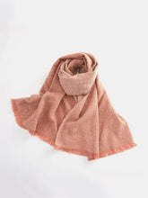 Soft heathered polyester scarf with raw hem in solid peach