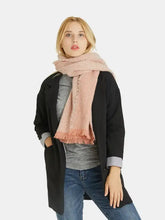 Woman modeling heathered polyester scarf with raw hem in peach