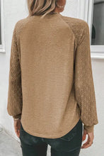 Women’s heathered round neck long sleeve blouse with brown knit and lace sleeves