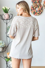 Heimish light taupe short-sleeved top with cream lace pocket drop shoulder design