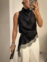 Black satin sleeveless high neck cami with lace trim hem featuring high neck lace detail for elegant wear