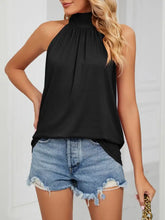 Black high neck tie back cami with halter neck sleeveless design and gathered flowing fabric neckline