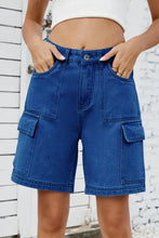 High rise denim shorts with cargo pockets in blue denim