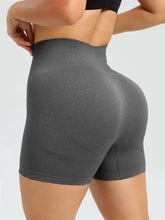 Charcoal grey high waist active shorts with textured pattern and logo, machine wash cold