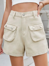 Beige high waist cargo denim shorts with cuffed hems and multi pockets