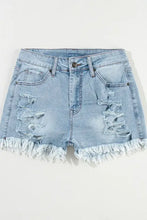 High waist denim shorts with distressed raw hem in light blue