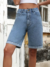 Light blue high waist denim shorts with cuffed hems